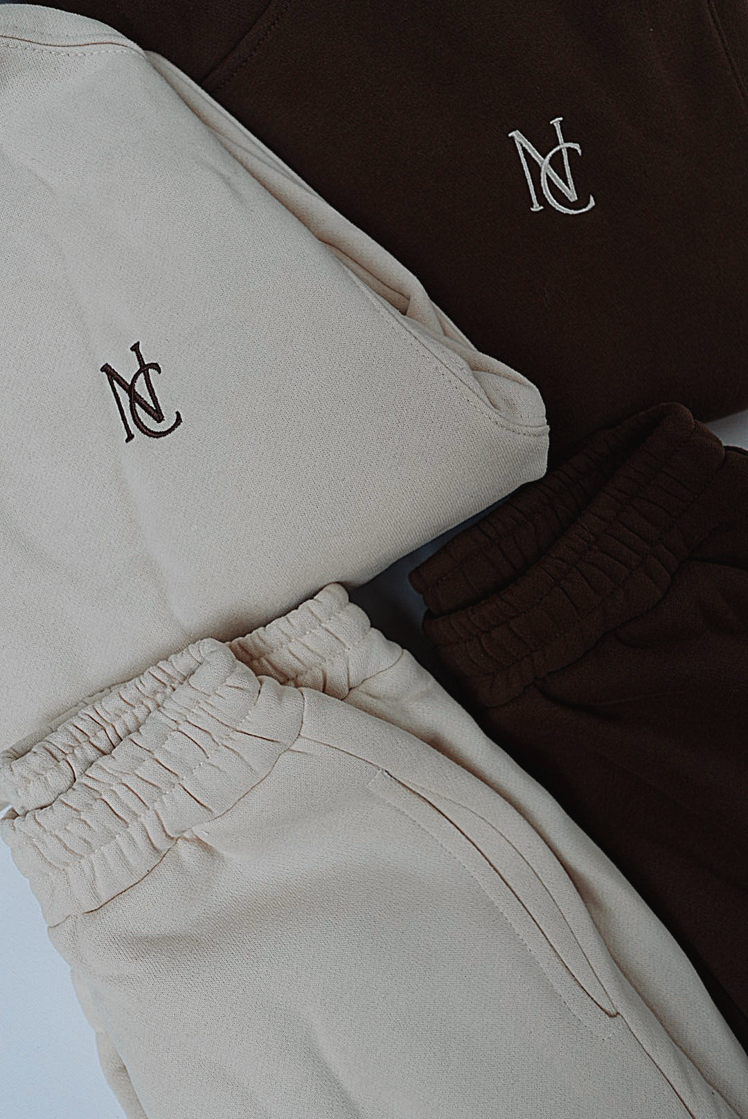 Kid's Mini & Me's - Butter Soft Hoodie features a cozy, oversized design with an NC logo, paired with matching jogger sweatpants for twinning comfort.