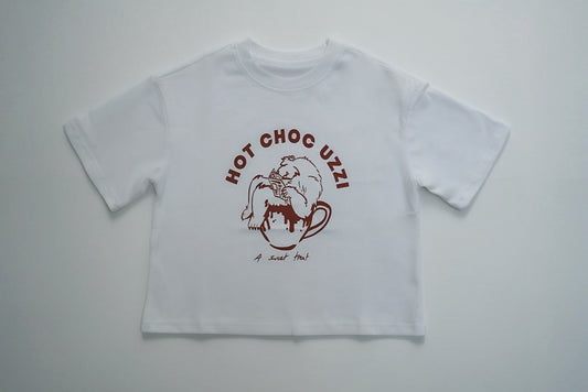 HOT CHOC UZZI TEE with cartoon bear in a mug graphic, perfect for winter. Made from 100% cotton, ideal for your child's cozy wardrobe.